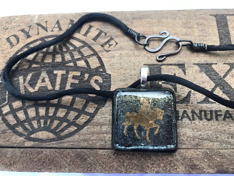 Gold Knight atop Horse on Iridescent Glass Pendant