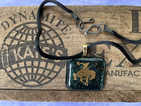 Gold Cowboy on Bucking Bronco Iridescent Glass Pendant